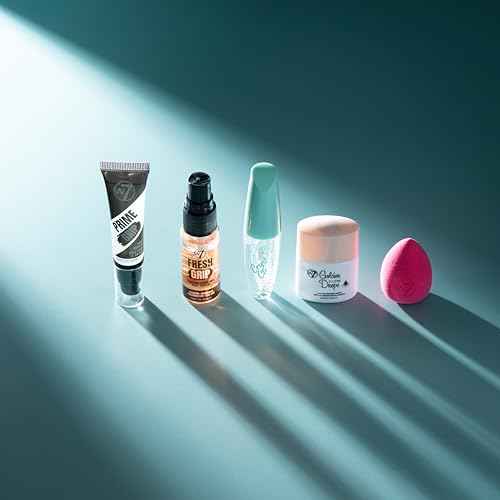 W7 On the Go Essentials Gift Set - Mini Makeup Must-Haves with Primer, Setting Spray, Mascara, Golden Glow Bronzing Drops & Beauty Sponge - Travel or Handbag Size Essentials