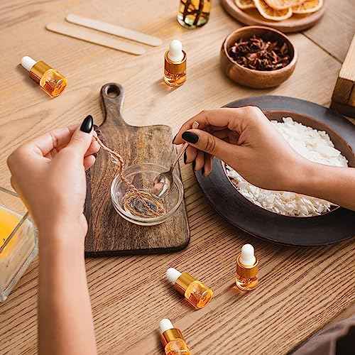 100 Pcs Mini Glass Oil Dropper Bottle Bulk, Clear Essential Small Empty Bottles Sample Containers Perfume Liquid Vials with Cap for Traveling (1 ml,Gold)