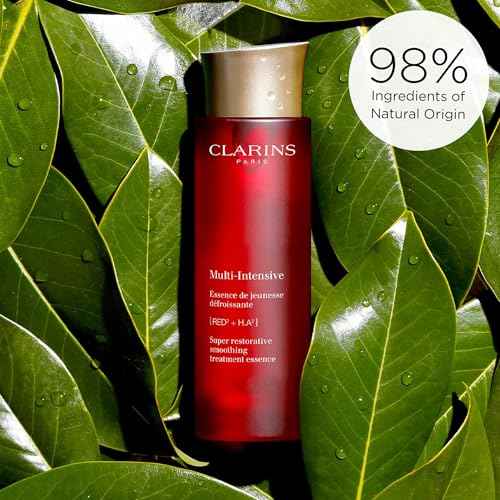 CLARINS Super Restorative Treatment Essence | Anti-Aging Face Lotion For Mature Skin Weakened By Hormonal Changes | Visibly Smoothes, Refines Pores, Softens Skin and Restores Radiance | 6.7 Fl Oz