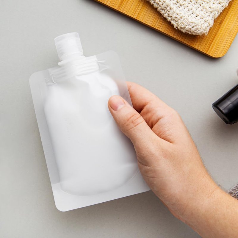 15PCS Portable Travel Fluid Makeup Packing Bag Travel Size, 2025 Portable Pouches for Toiletries,Refillable Travels Accessories for Shampoo Conditioner Lotion Soap Liquids (15pcs)