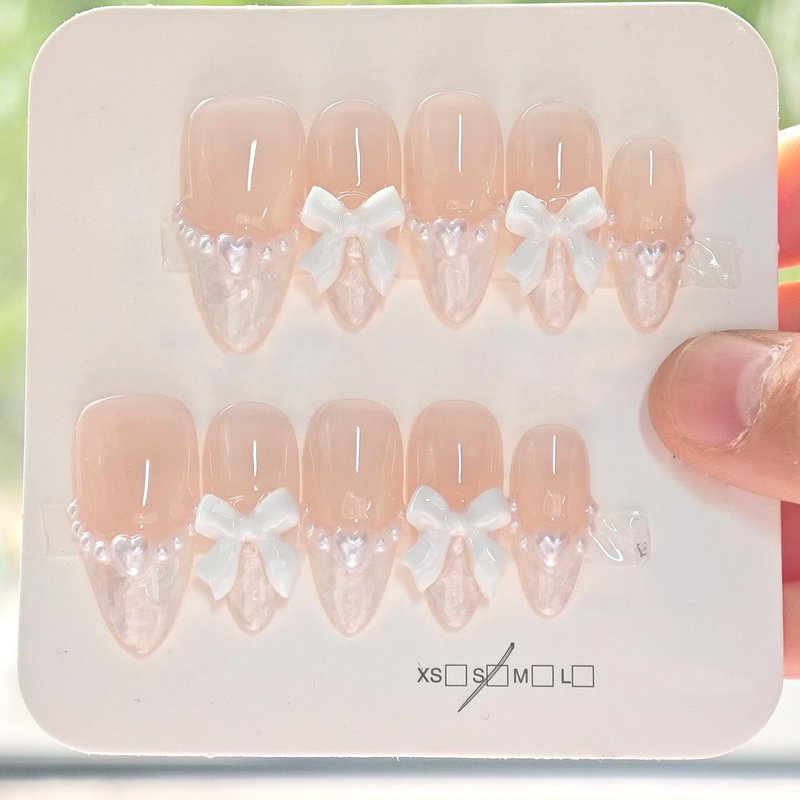 24Pcs Medium Almond Press on Nails French Tip Fake Nails 3D White Bow with Pearl Design Nude Pink Full Cover Glue on Nails Cute False Nails Artificial Acrylic Stick on Nails for Women Manicure Salon
