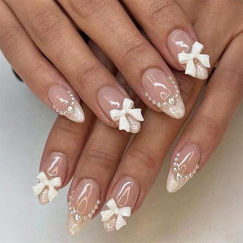 24Pcs Medium Almond Press on Nails French Tip Fake Nails 3D White Bow with Pearl Design Nude Pink Full Cover Glue on Nails Cute False Nails Artificial Acrylic Stick on Nails for Women Manicure Salon