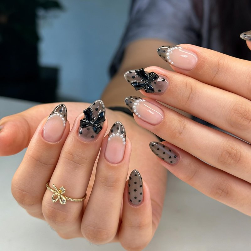 24 Pcs Black Polka Dot Press on Nails Medium Almond French Fake Nails with Bow Charms Designs Full Cover Acrylic Artificial Nails Glossy Glue on Nails Reusable Pearl French Stick on Nails for Women