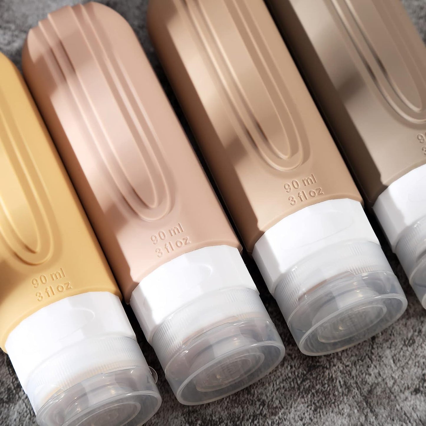 Travel Bottles for Toiletries - TSA Approved 3oz Leak-Proof Silicone Containers | BPA-Free Refillable Travel Accessories (4 Pack)