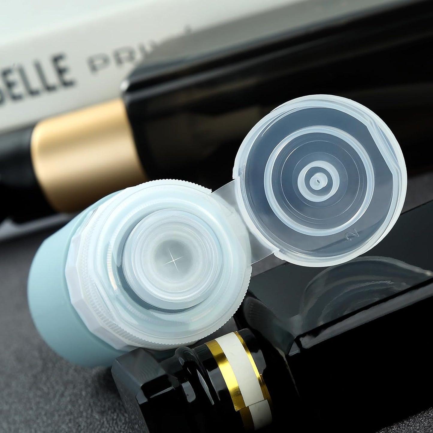 Travel Bottles for Toiletries - TSA Approved 2oz Leak Proof Containers | BPA Free with Toiletry Bag (4 Pack)