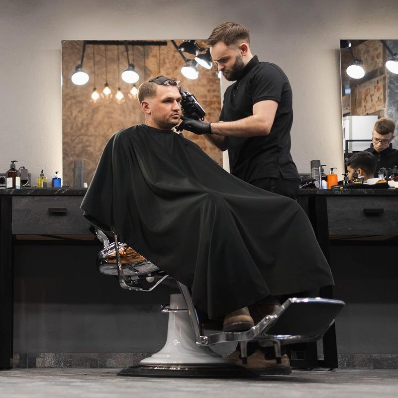 Regine Switzerland Professional Hair Cutting Cape - Adjustable Waterproof Barber Cape for Men & Women | 52" x 47", Black