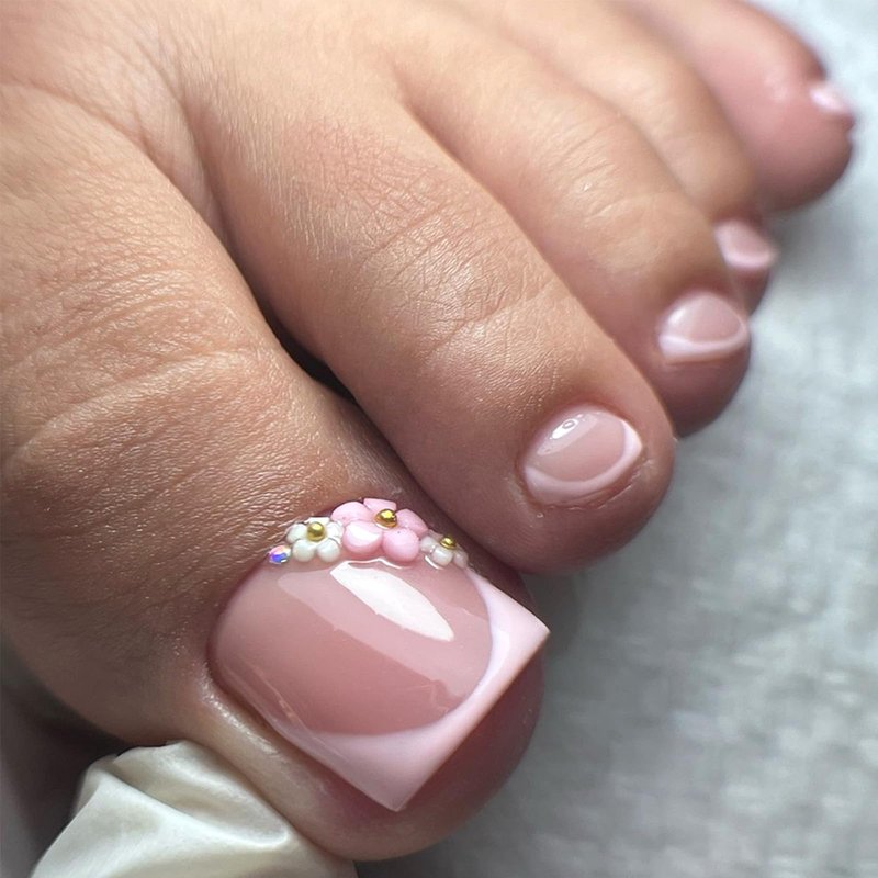 Pink French Tip Press on Toenails Short Square Fake Toe Nails with Flower Charms Nude Glossy Toe Nail Press ons Spring Summer Floral Toe Nail Tips Acrylic Stick on Toenails for Women 24Pcs