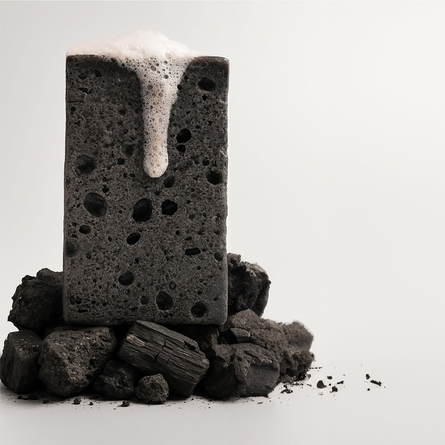 T.Taio Esponjabon Charcoal Soap Sponge - Cleansing Shower Scrubber - Cleaning Bath Wash Scrub - Oil Removal - Massage & Lather Foot, Elbow, & Face - Bathroom Accessories - Charcoal, Mini Soap Included