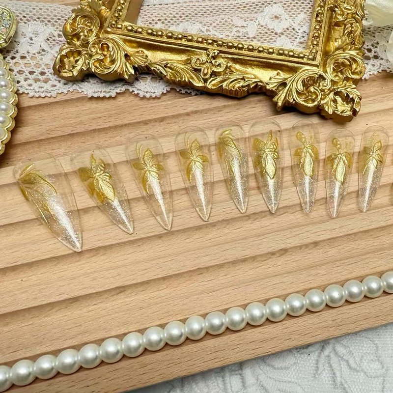 24Pcs Gold Press on Nails Almond Long Glitter Nude Fake Nails Luxury Metallic Flower Acrylic Nails Glue on Nails Reusable Full Cover False Nails for Women Wedding Party Daily DIY Manicure
