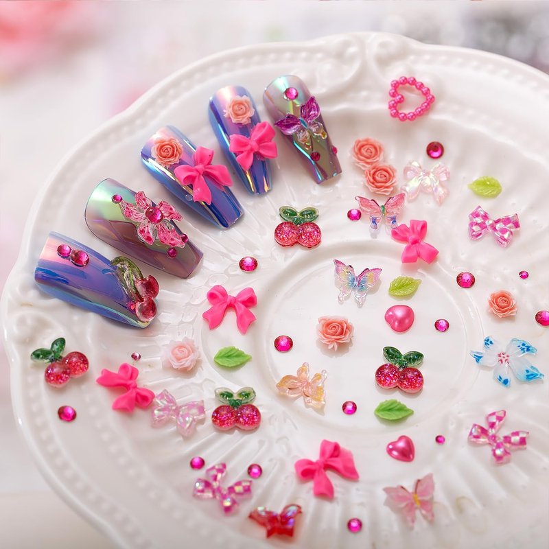 28 Grids Nail Charms Kit with Rhinestones for Nails, 3D Kawaii Bows, Cherry, Flowers, Butterfly. Red Pink Gold Nail Gems, Pearls & Metal Studs. DIY Manicure Art Supplies with Wax Pen & Tweezers