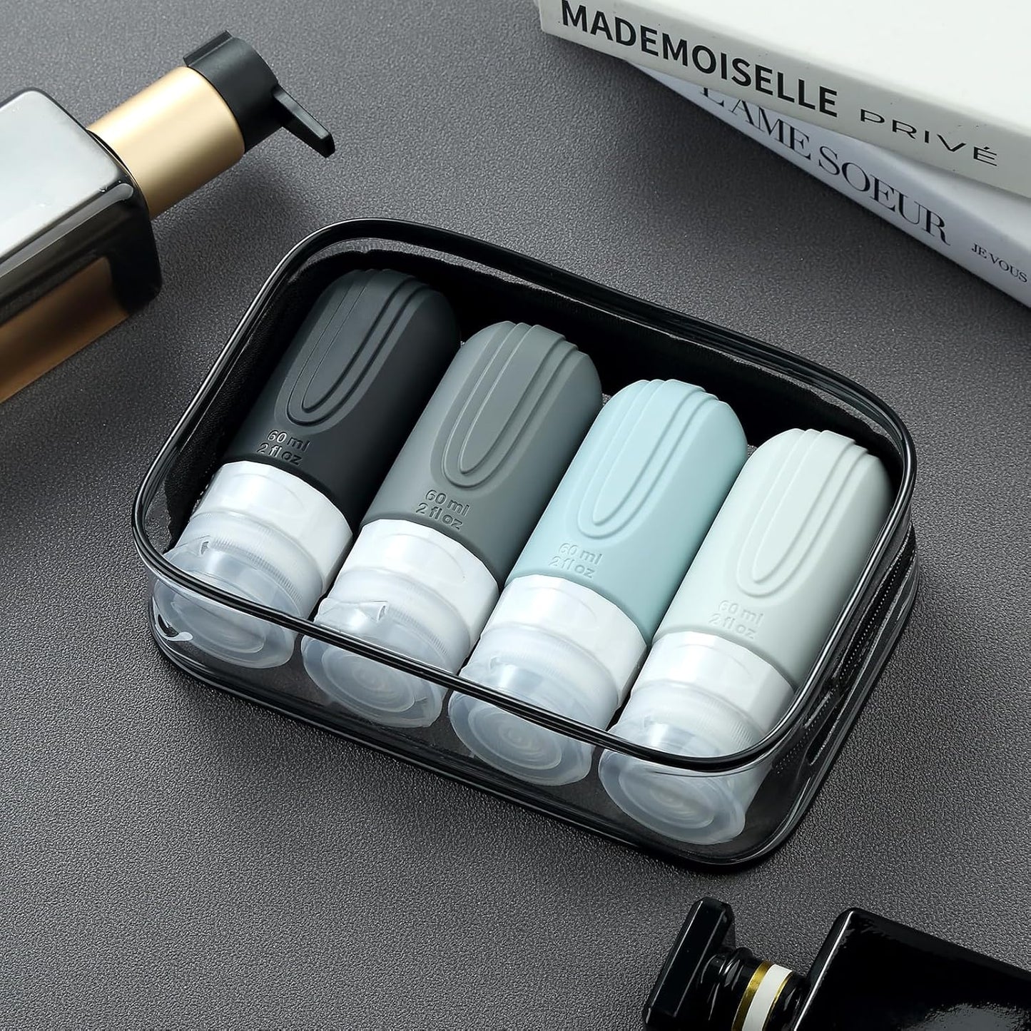 Travel Bottles for Toiletries - TSA Approved 2oz Leak Proof Containers | BPA Free with Toiletry Bag (4 Pack)