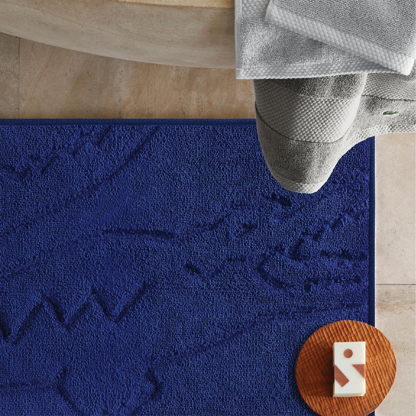 Lacoste Heritage Bath Rug – Ultra Soft Quick-Dry Microfiber and Tufted, Super Absorbent with Non-Slip Backing, Signature Crocodile Embossed Design and Stylish Bathroom Mat 20"x32" – Surf Blue